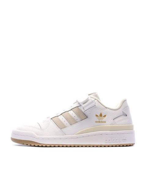 adidas white and beige trainers.